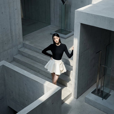 Jupe courte blanche évasée en tricot avec pompons - Mode Coréenne Koreanxwear